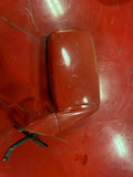 Red passenger side view mirror