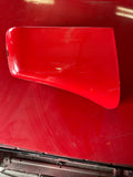 Passenger side rear bumper, end cap in guards red