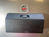 Early black glove box lid with functioning, hinges, and latch