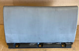Grey glove box door and hinge