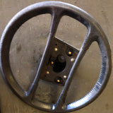 Four spoke black steering wheel