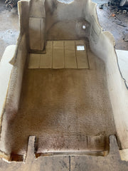 Drivers side grey tan footwell carpet
