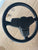 Three spoke early steering wheel