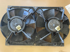 Twin radiator cooling fans with turbo shroud