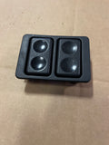 Black early driver side door, switch pair with housing