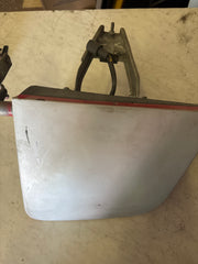 Driver headlight bucket assembly