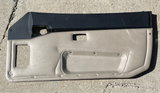 Black and tan two tone passenger side side door card