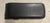 Black late center armrest console