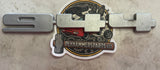 Rear silver Porsche emblem