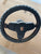 Porsche 944 extended hub steering wheel.