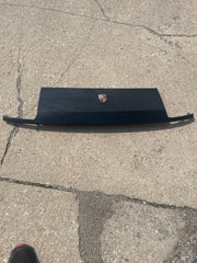 Black header panel with emblem