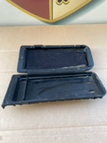 Armrest cassette storage tray for a late car